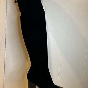 Elegant Black Belvet Women's Thigh-High Boots  Used on fashion runway.